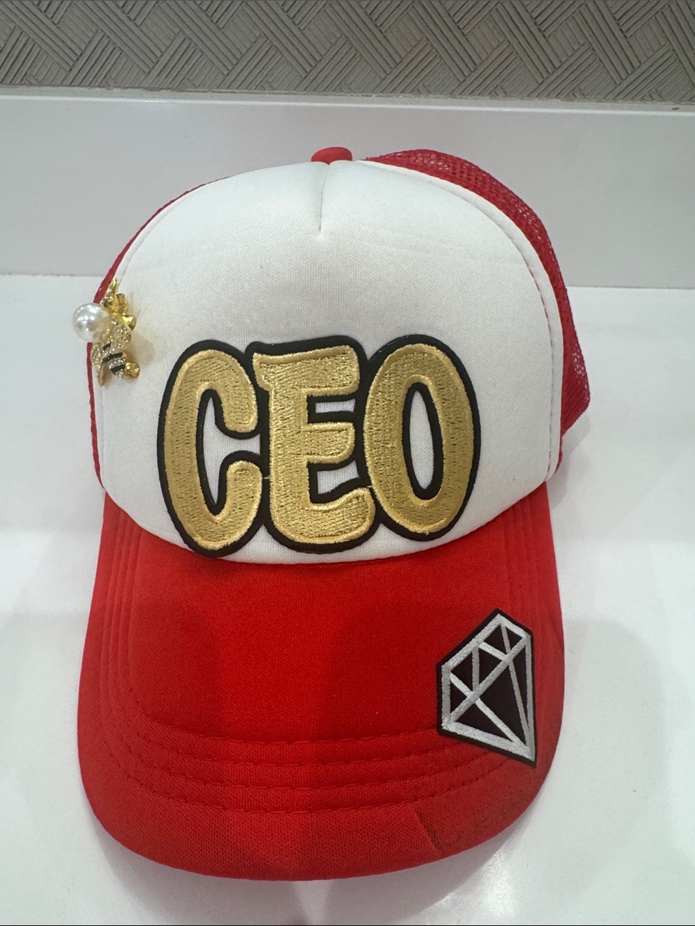 CEO Red and White 'CEO' Trucker Hat with queen bee pin attached NEW